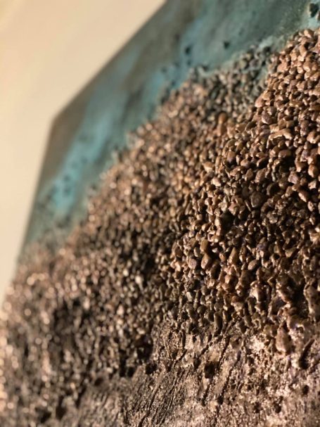 Pebble Beach (close-up) Close up of rocks on canvass